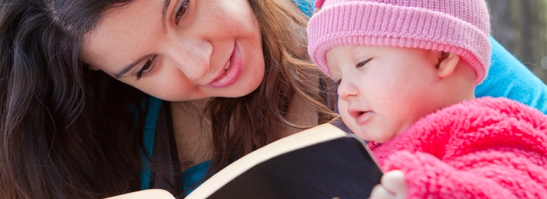 Baby and mom reading Bible