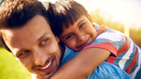 Dads taking me on an outdoor adventure. Portrait of a little boy bonding with his father outdoors.