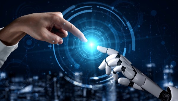 MANO UMANO TOCCA MANO ROBOT COME NELLA CREAZIONE DEL GIUDIZIO UNIVERSALE