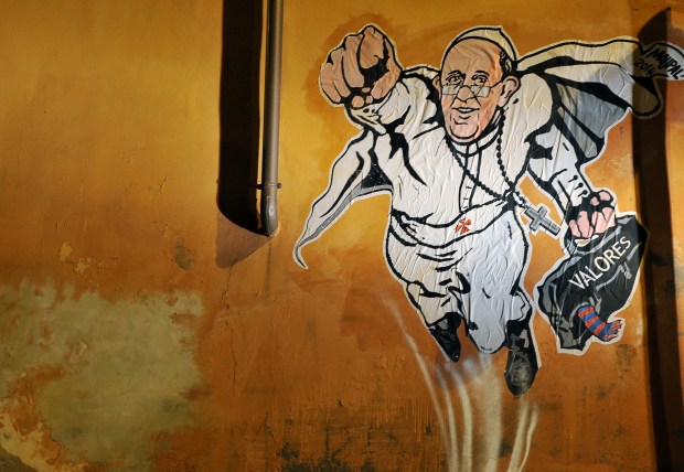 street-art-collage-by-Italian-artist-Maupal-showing-Pope-Francis-AFP