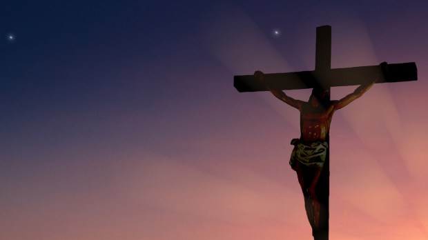 The crucifixion of Jesus Christ on the mountain has a background as before the sunset